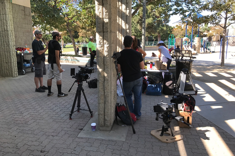 The crew filming an episode of Booty Queens outside a polling place in Los Angeles